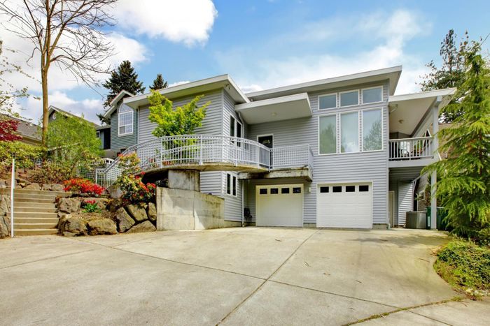 gray house with driveway
